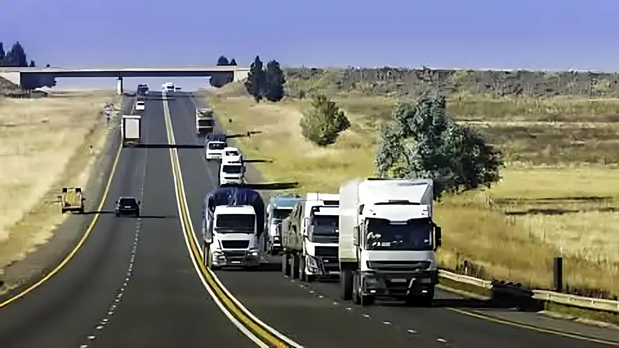 Container trucks on a highway in the Copperbelt corridor