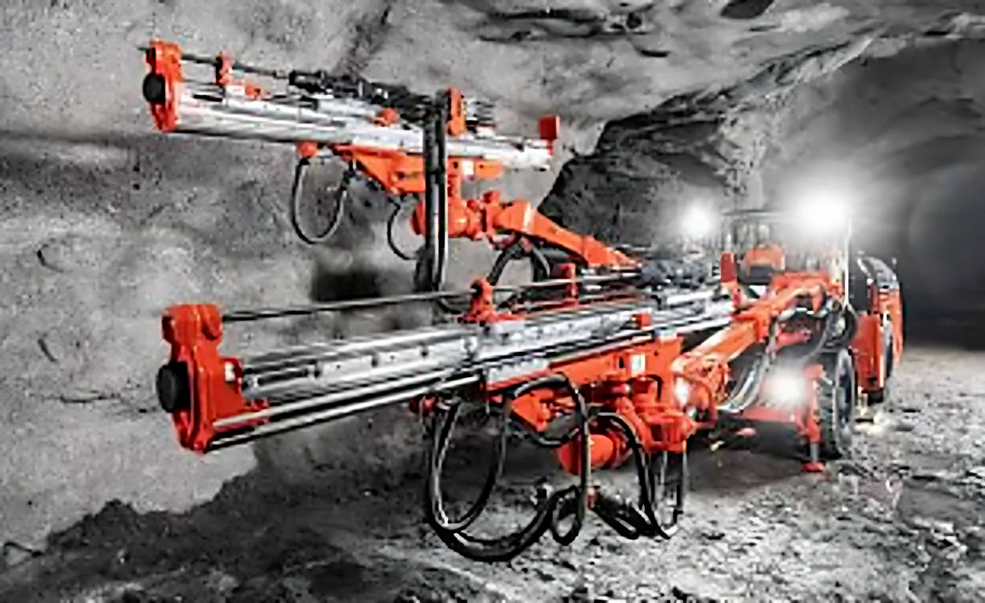 Underground drill rig drilling a development face